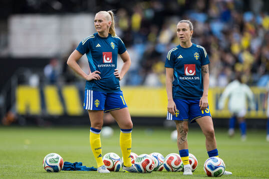 Stina Blackstenius and Julia Zigiotti Olme of Sweden