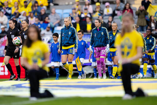 Stina Blackstenius and goalkeeper Jennifer Falk of Sweden