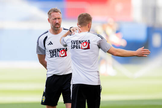 Head coach Graham Potter and assistant coach Sebastian