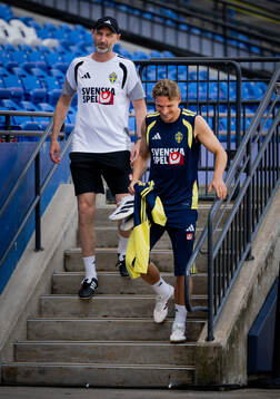 Assistant coach Andreas Georgson and Carl Starfelt of the