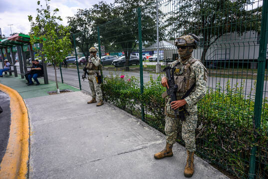 Military personnel outside Estadio Monterrey