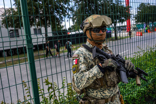 Military personnel outside Estadio Monterrey