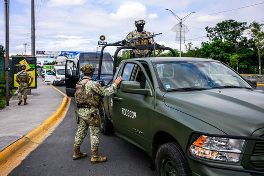 Military personnel outside Estadio Monterrey