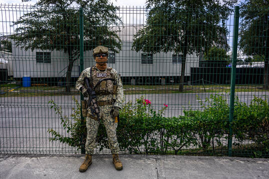 Military personnel outside Estadio Monterrey
