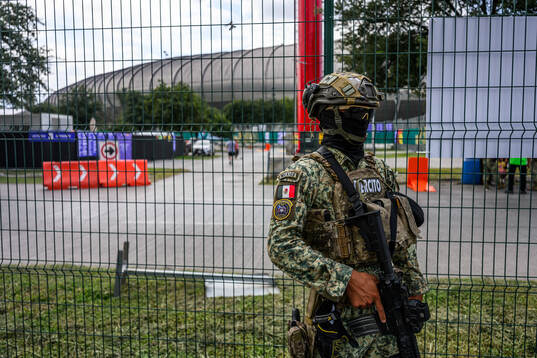 Military personnel outside Estadio Monterrey