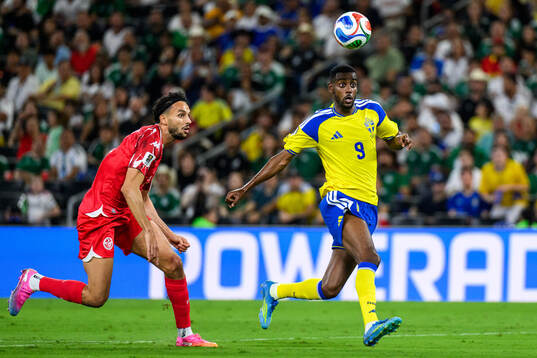 Montassar Talbi of Tunisia and Alexander Isak of Sweden
