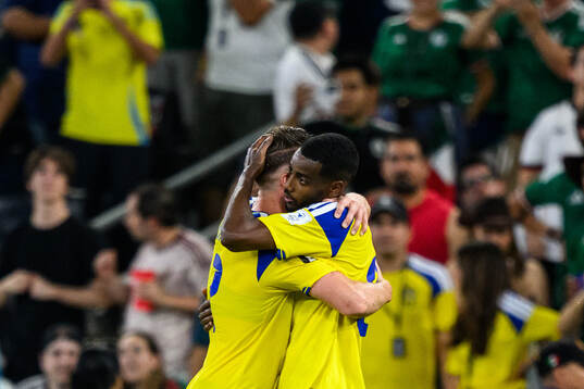 Viktor Gyökeres and Alexander Isak of Sweden celebrate