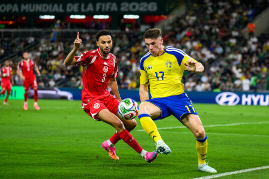 Montassar Talbi of Tunisia and Viktor Gyökeres of Sweden
