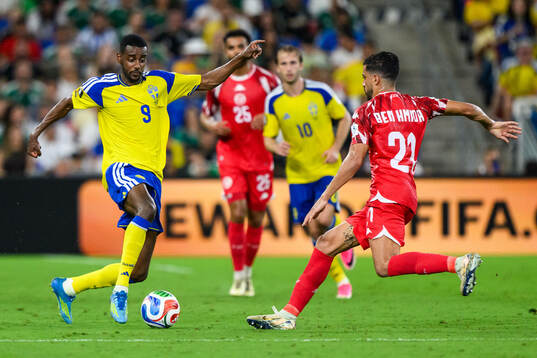 Alexander Isak of Sweden and Mohamed Amine Ben Hmida of
