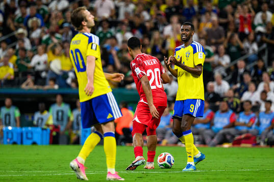 Benjamin Nygren and Alexander Isak of Sweden look dejected