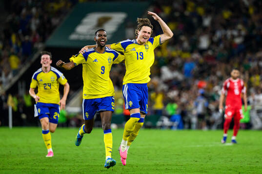 Alexander Isak and Mattias Svanberg of Sweden celebrate