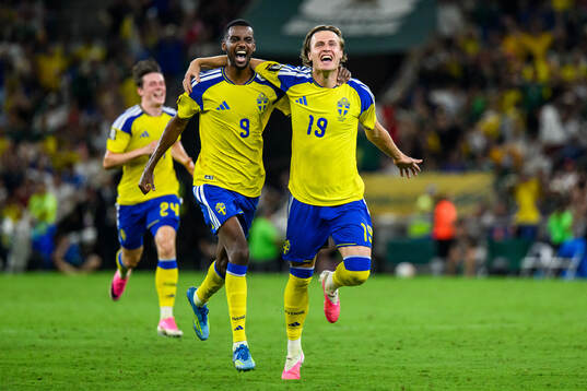 Alexander Isak and Mattias Svanberg of Sweden celebrate