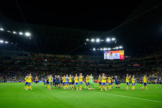Players of Sweden celebrate