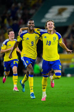Alexander Isak and Mattias Svanberg of Sweden celebrate
