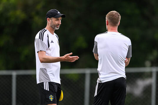 Assistant coach Andreas Georgson and head coach Graham