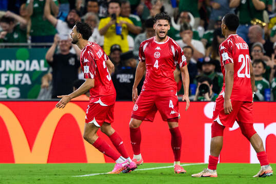 Omar Rekik of Tunisia celebrates