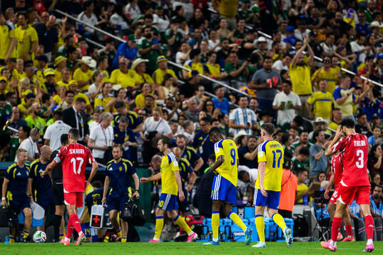 Alexander Isak and Viktor Gyökeres of Sweden leave the
