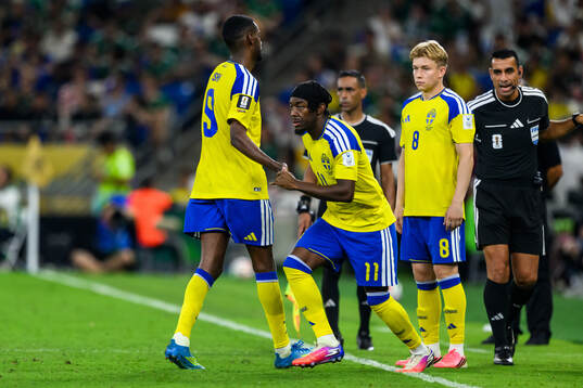 Alexander Isak and Anthony Elanga of Sweden