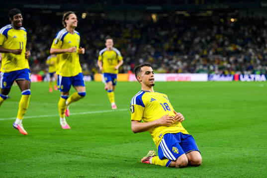 Yasin Ayari of Sweden celebrates