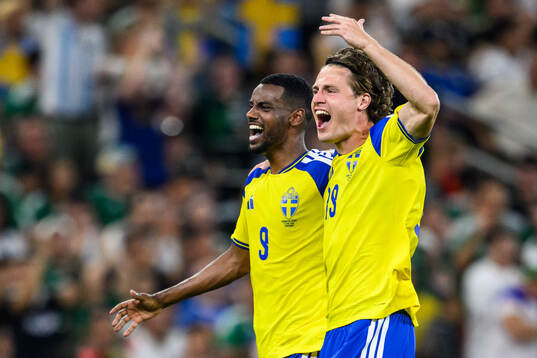 Alexander Isak and Mattias Svanberg of Sweden celebrate the