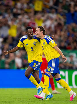 Alexander Isak and Mattias Svanberg of Sweden celebrate the