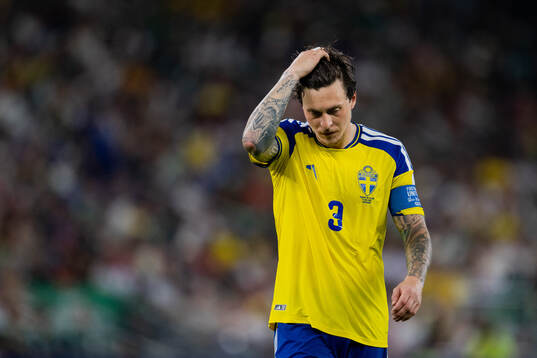 Victor Nilsson Lindelöf of Sweden looks dejected