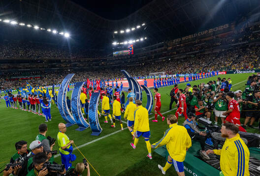 Players of Sweden enter the pitch