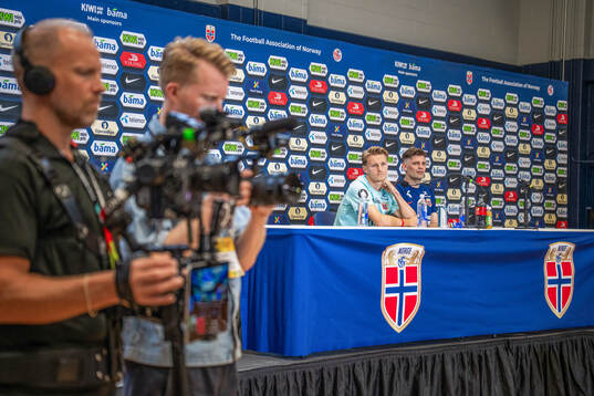 Martin Ødegaard and press officer Morten Morisbak