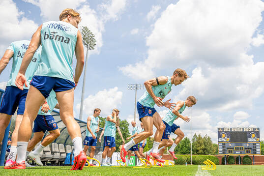 Martin Ødegaard and David Møller Wolfe of the Norwegian