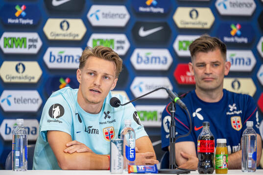 Martin Ødegaard and press officer Morten Morisbak