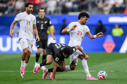 Saman Ghoddos and Ramin Rezaeian of Iran against Sarpreet