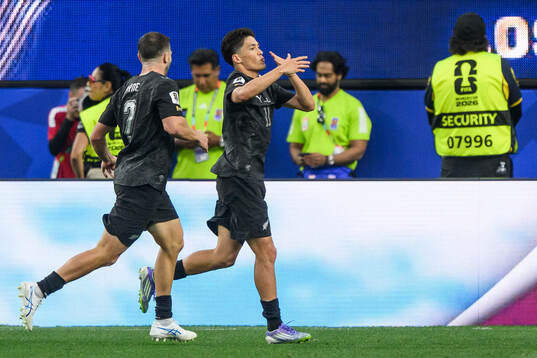 Tim Payne and Elijah Just of New Zealand celebrate