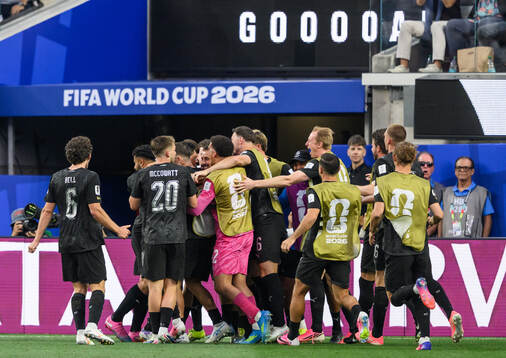Players of New Zealand celebrate the 1-2 goal scored by