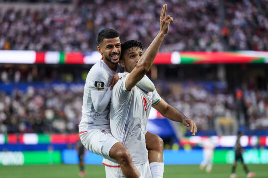 Mehdi Ghayedi and Mohammad Mohebbi of Iran celebrate