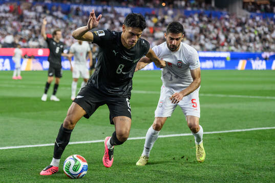 Marko Stamenic of New Zealand and Milad Mohammadi of Iran