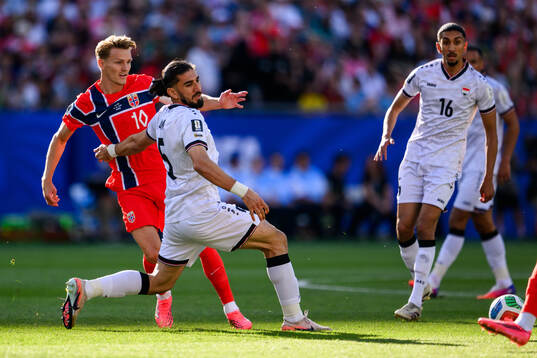 Martin Ødegaard of Norway and Akam Hashim Rahman of Iraq