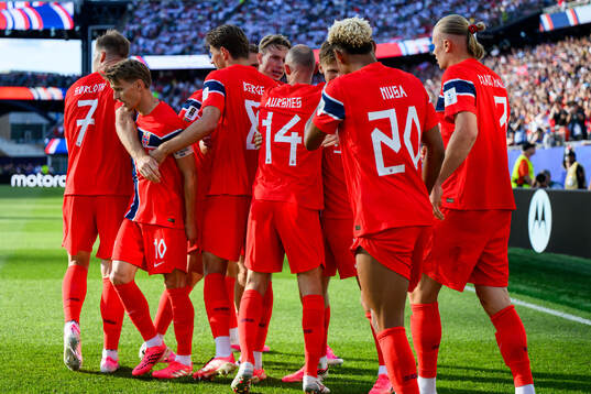 Players of Norway celebrate 0-1