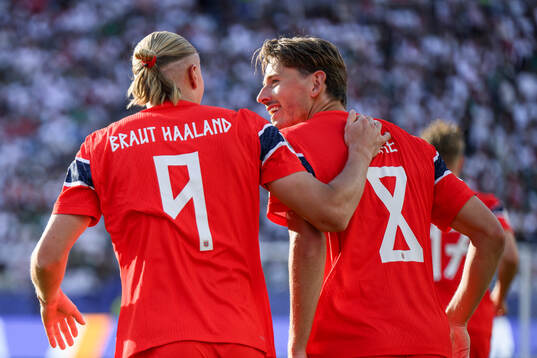 Erling Braut Haaland and Sander Berge of Norway celebrate