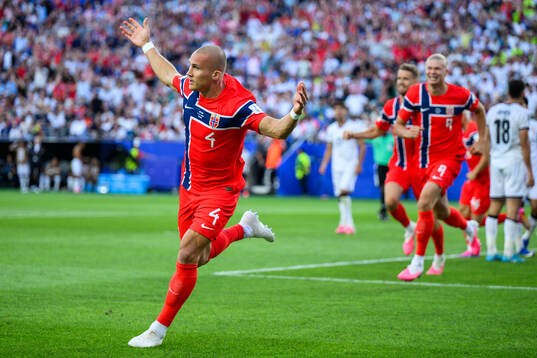 Leo Østigård of Norway celebrates