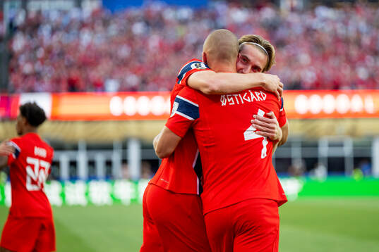 Leo Østigård and Kristian Thorstvedt of Norway celebrate