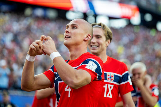 Leo Østigård and Kristian Thorstvedt of Norway celebrate