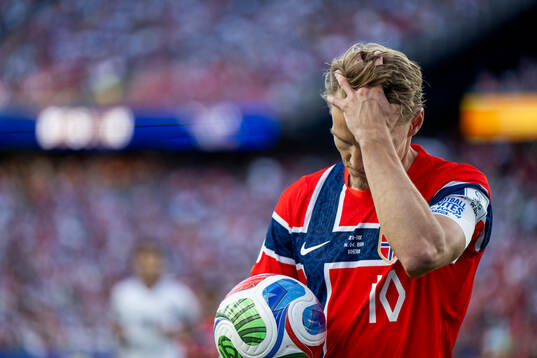 Martin Ødegaard of Norway looks dejected