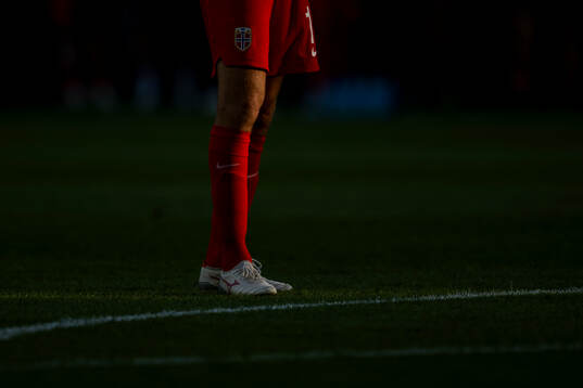 Close-up of the legs of a Norwegian player