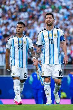 Lionel Messi and Lautaro Martinez of Argentina