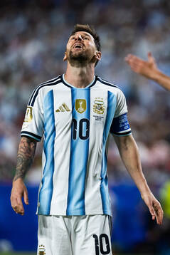 Lionel Messi of Argentina looks dejected