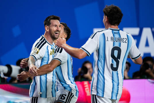 Lionel Messi, Nahuel Molina and Julian Alvarez of Argentina
