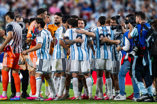 Lionel Messi and Julian Alvarez of Argentina celebrate