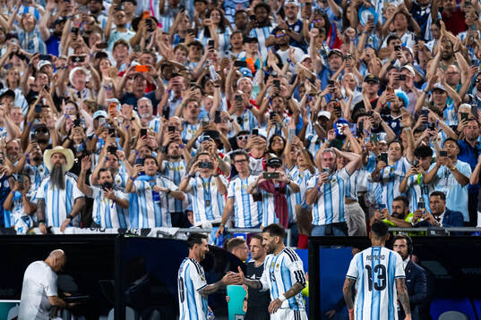 Lionel Messi and Nicolas Otamendi of Argentina