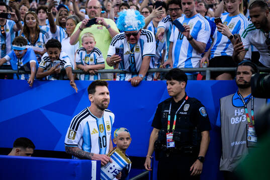 Lionel Messi of Argentina enters the pitch for the