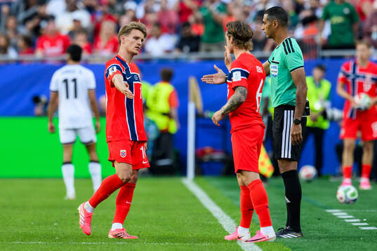 Martin Ødegaard and Patrick Berg of Norway